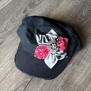 Stylish Black Cap with Red and Gray Bow
